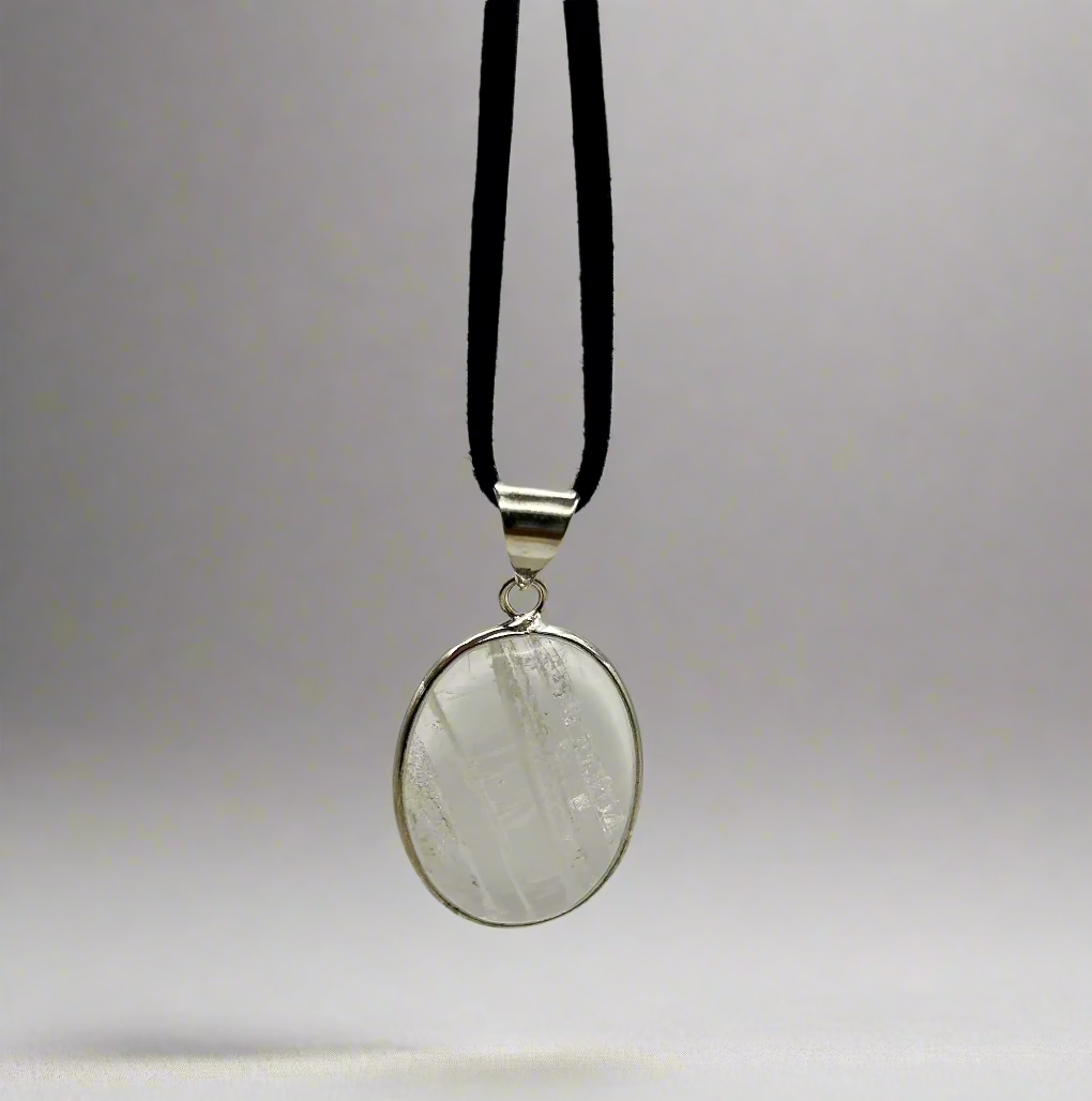 Clear Quartz Pendant On Suede